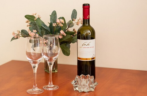 Dining Table with Israeli Wine and Flowers