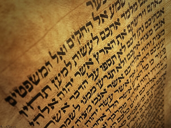 Hebrew letters on an ancient scroll